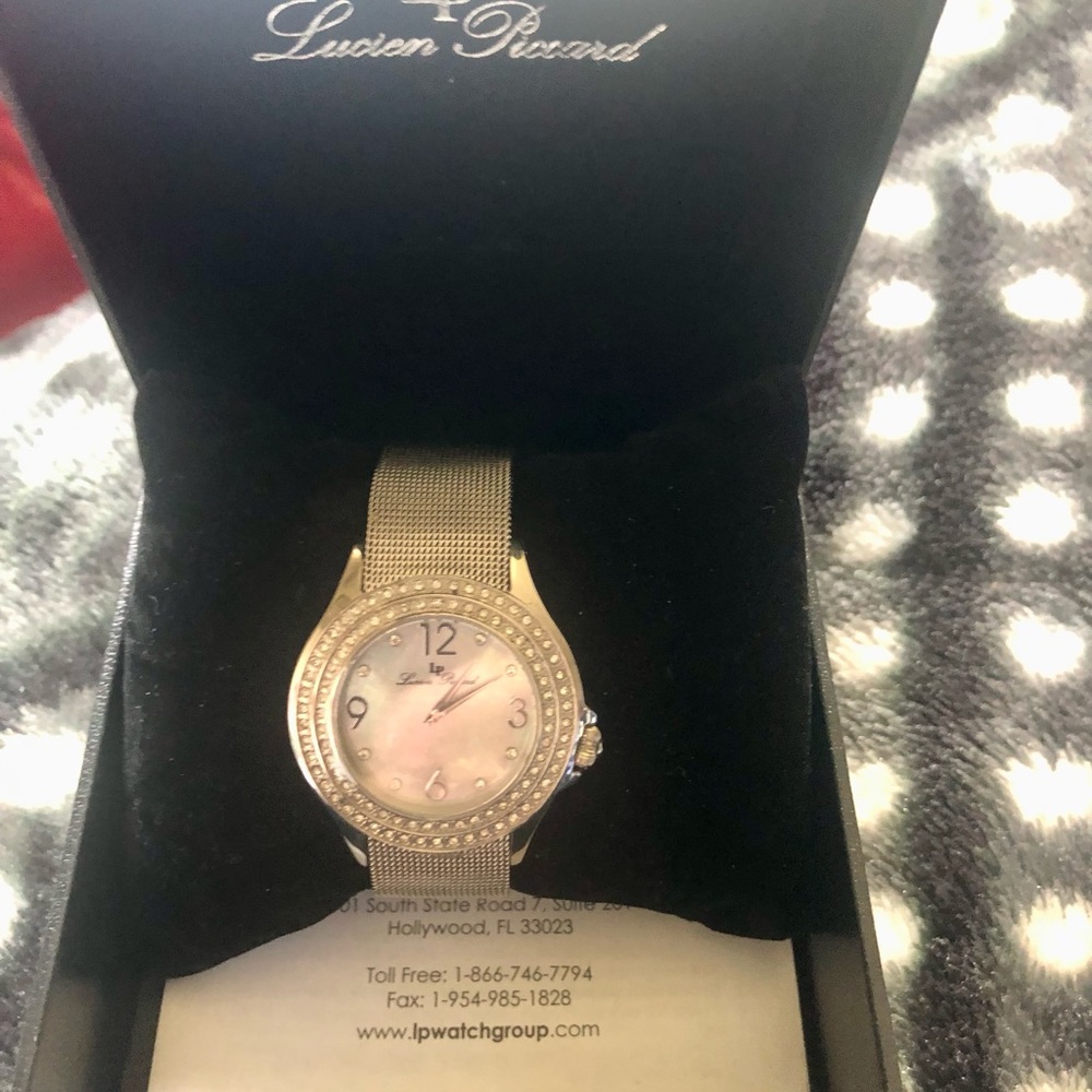 Beautiful Lucien Picard ladies watch BN.  Mother of Pearl face.
